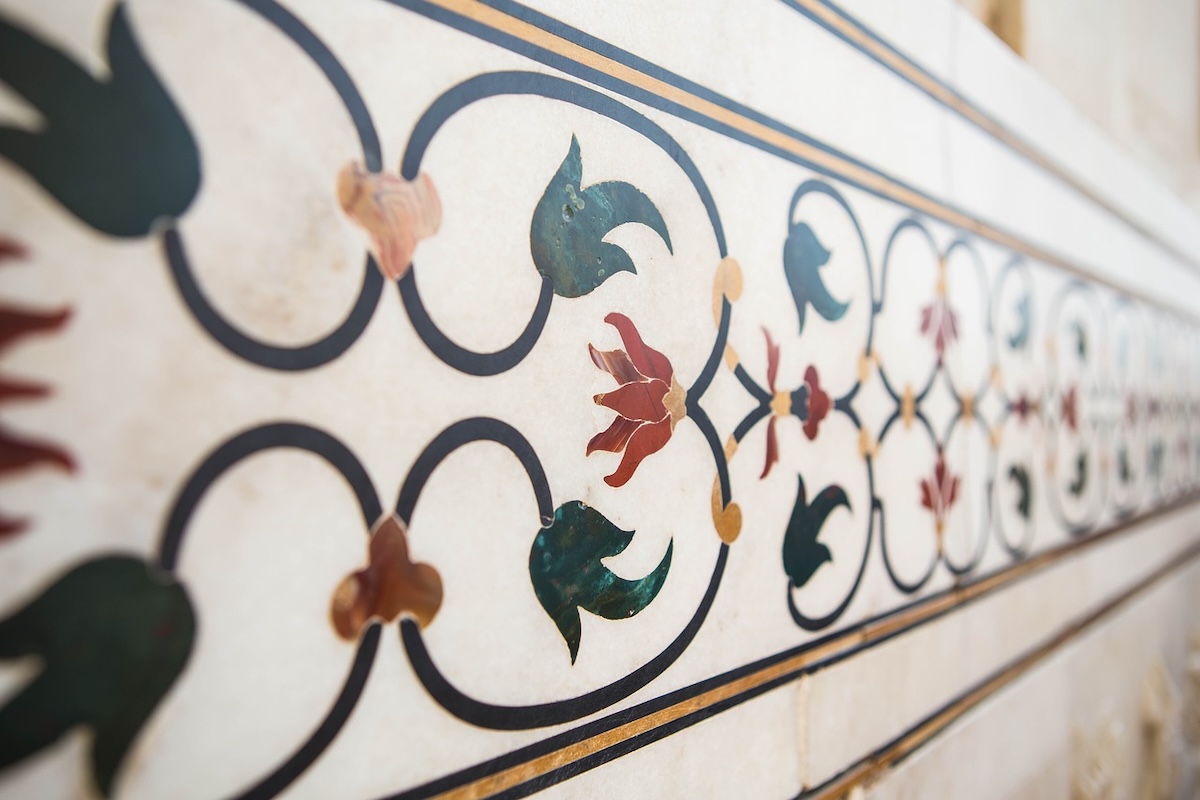 Stone water feature with carved elements